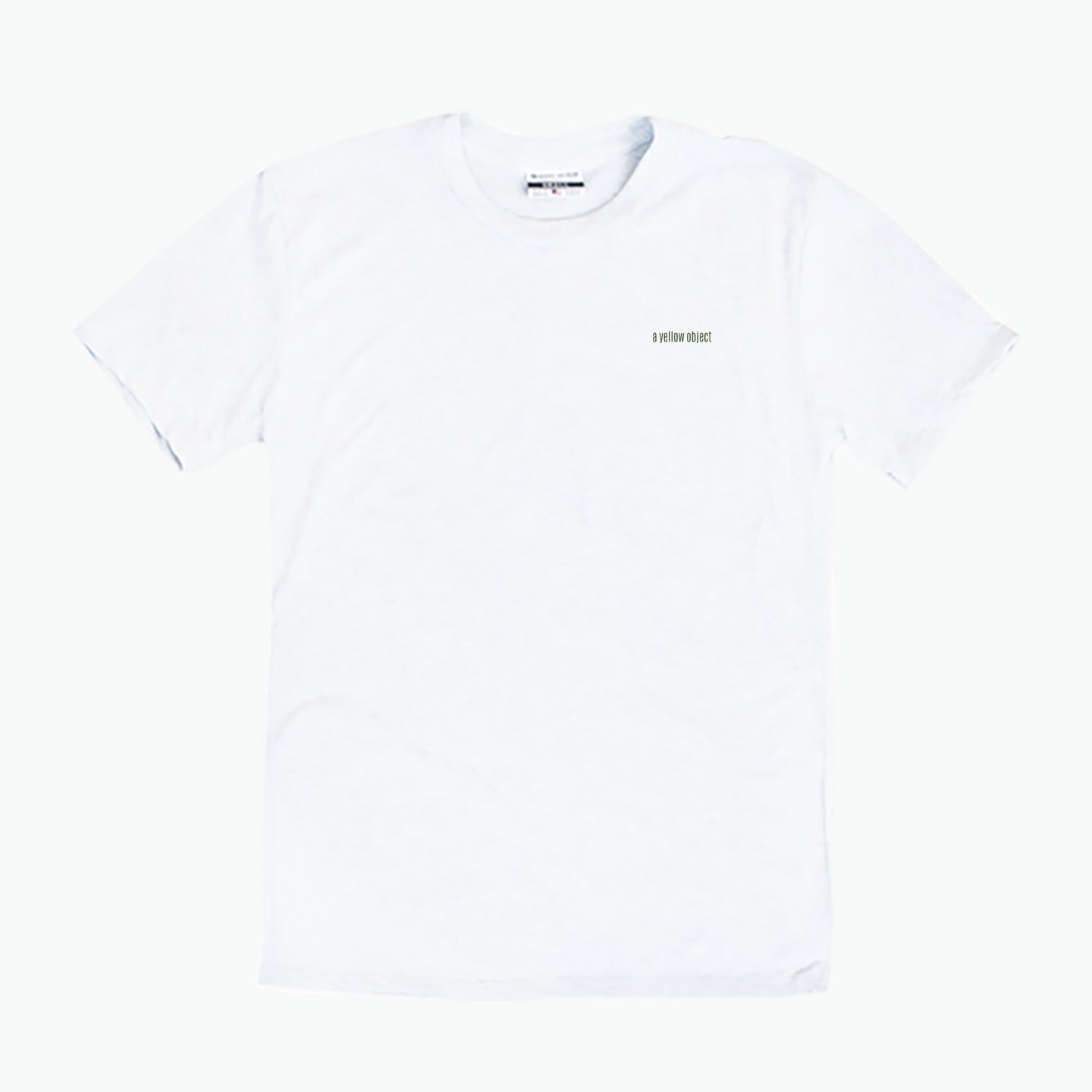 Being Watched (White) - a yellow object