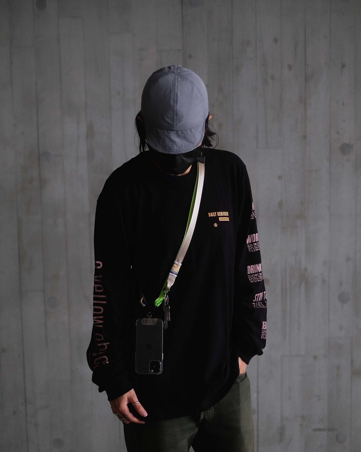 We Disconnect 2.0 Phone Lanyard (Khaki) - a yellow object