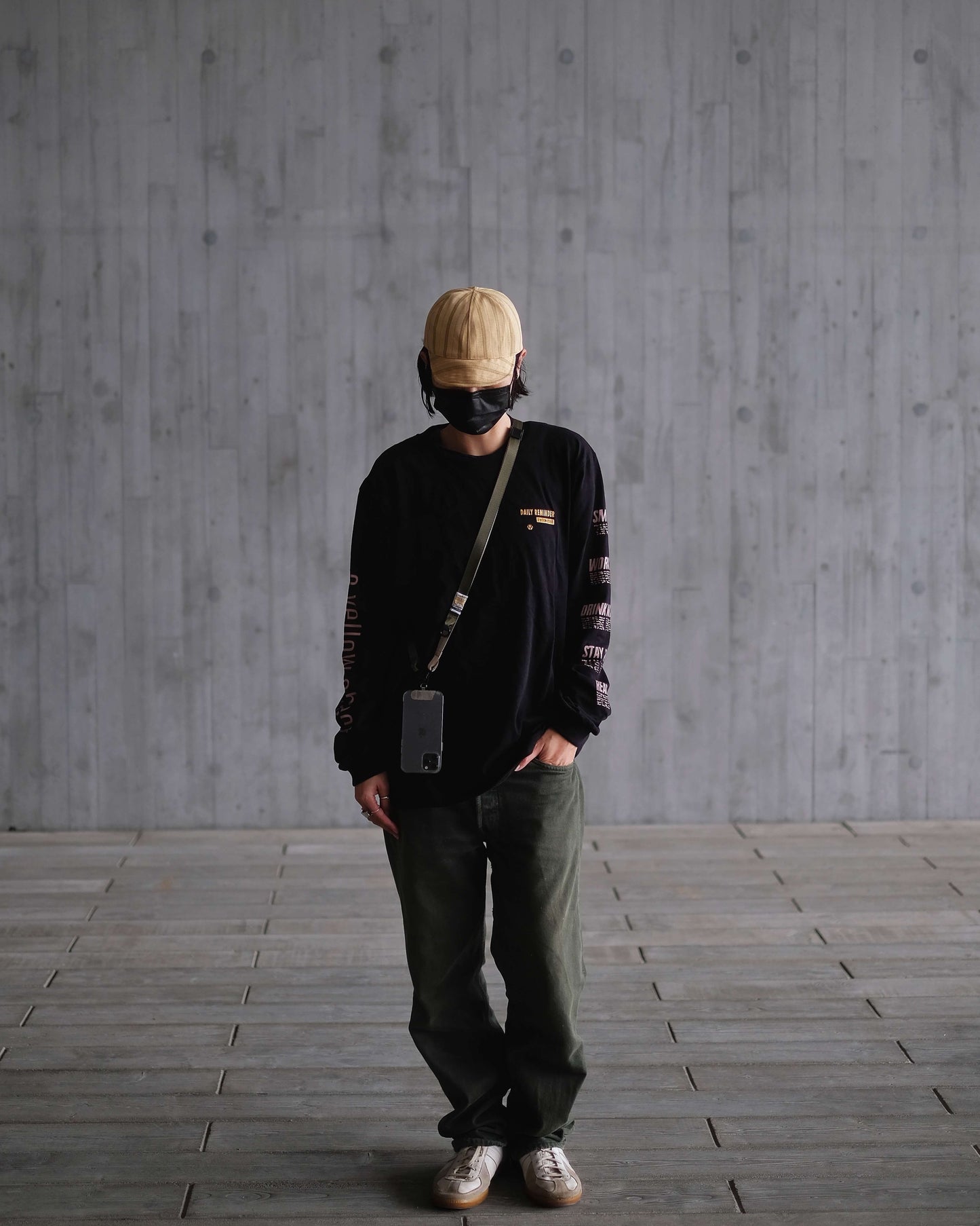 We Disconnect 2.0 Phone Lanyard (Army) - a yellow object