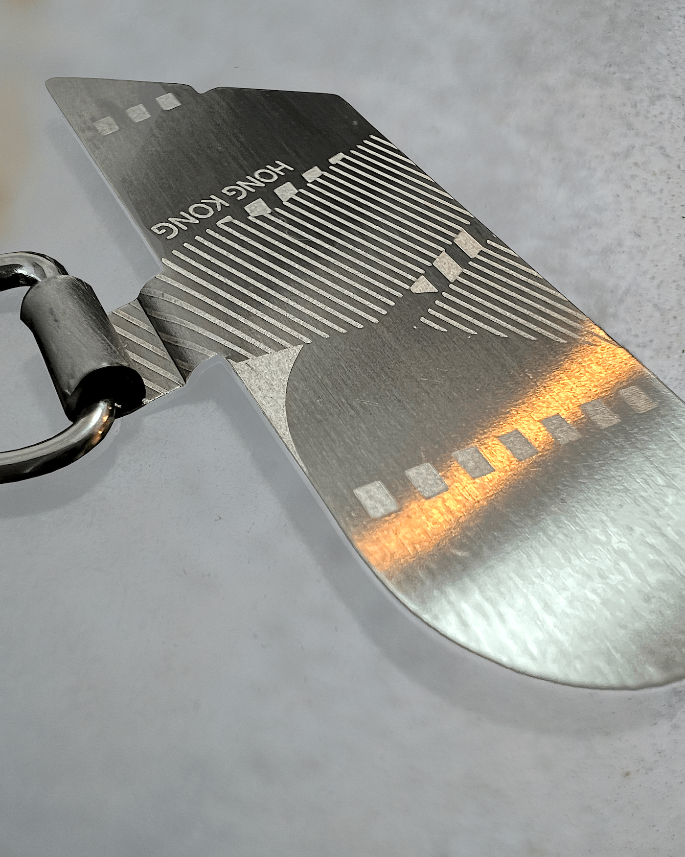 Stainless Steel Plate for Lanyard - a yellow object