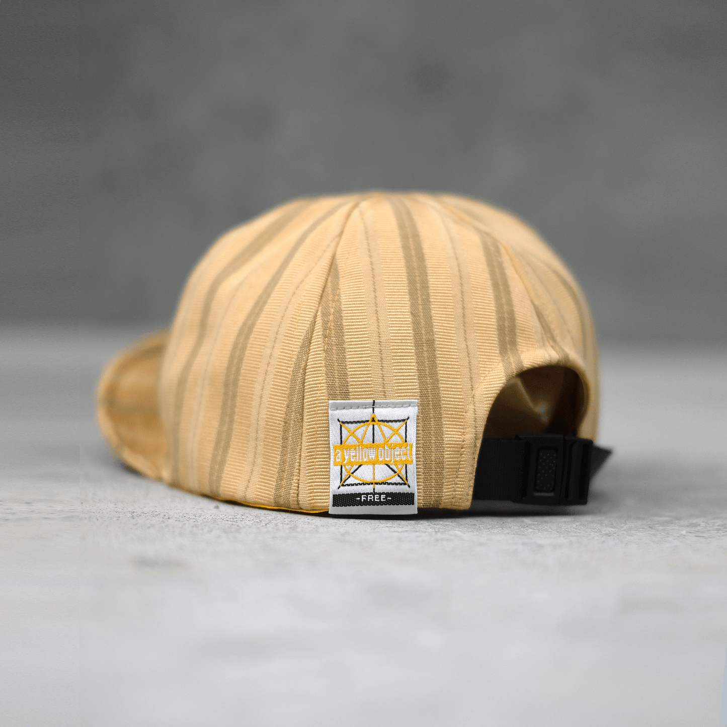 Just A Cap (Sai Gwaa Bo) - a yellow object