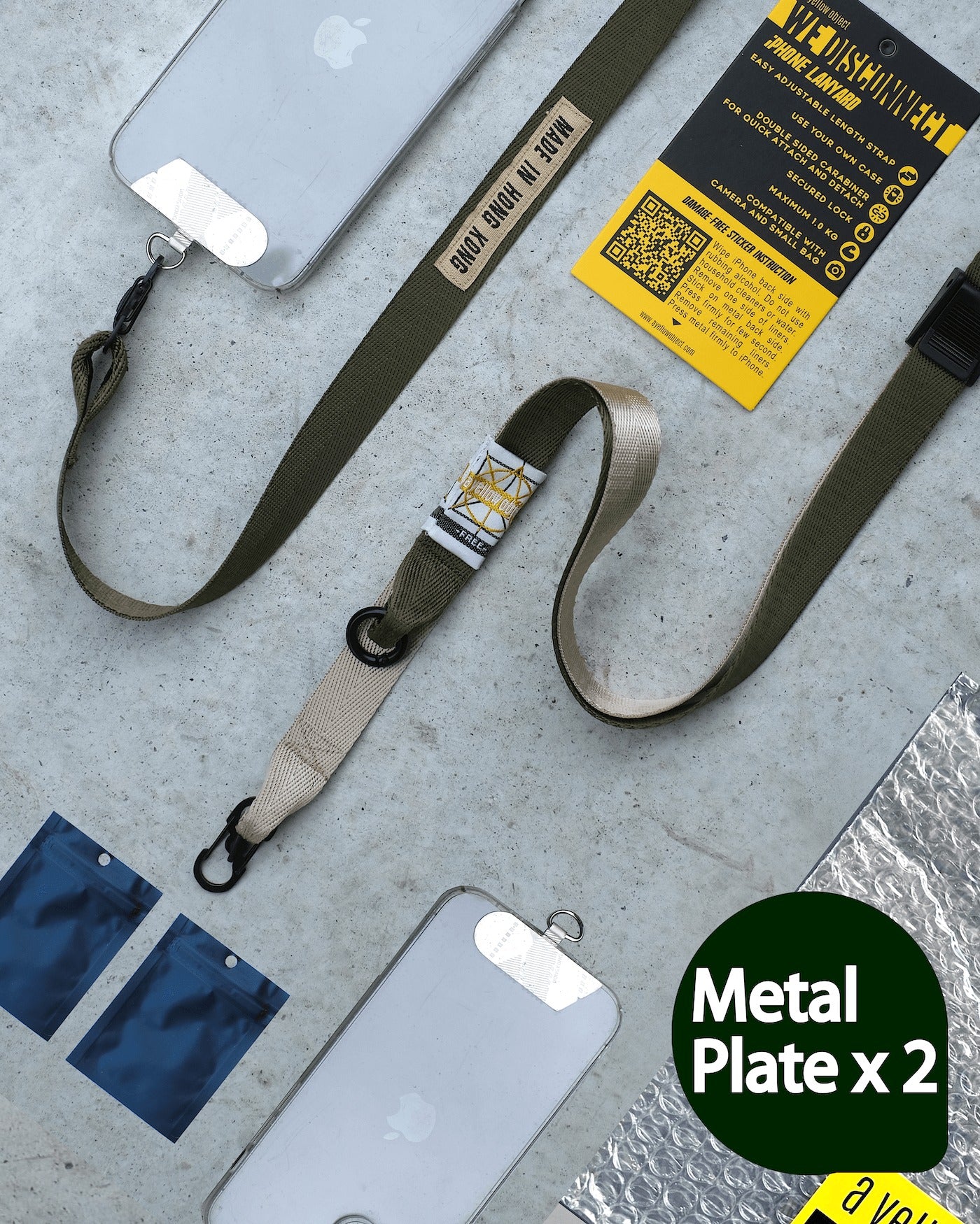 We Disconnect 2.0 Phone Lanyard (Army) - Metal Plate x 2 - a yellow object